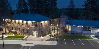 A building with lights on the front

AI-generated content may be incorrect.