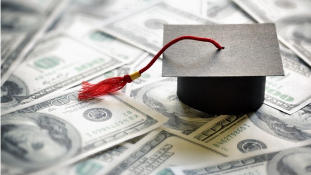 Pictured: Graduation cap on $100 bills/iStock, Bri