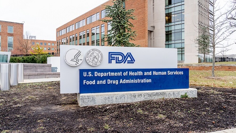 Pictured: Blue sign outside FDA building/JHVEPhoto