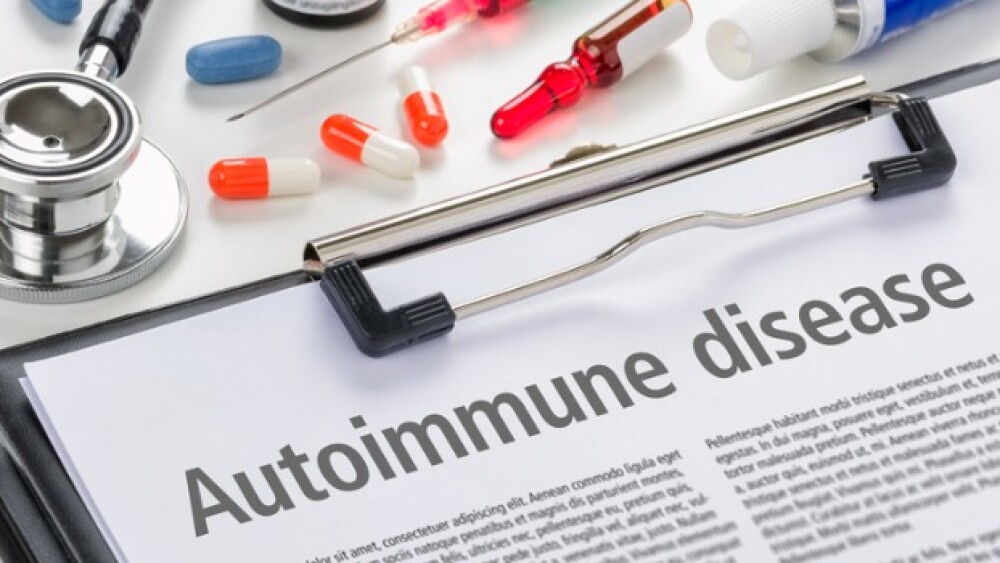 Pictured: Autoimmune written on clipboard/iStock,