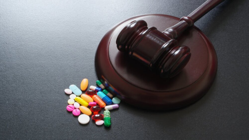 Pictured: Gavel with an assortment of tablets and