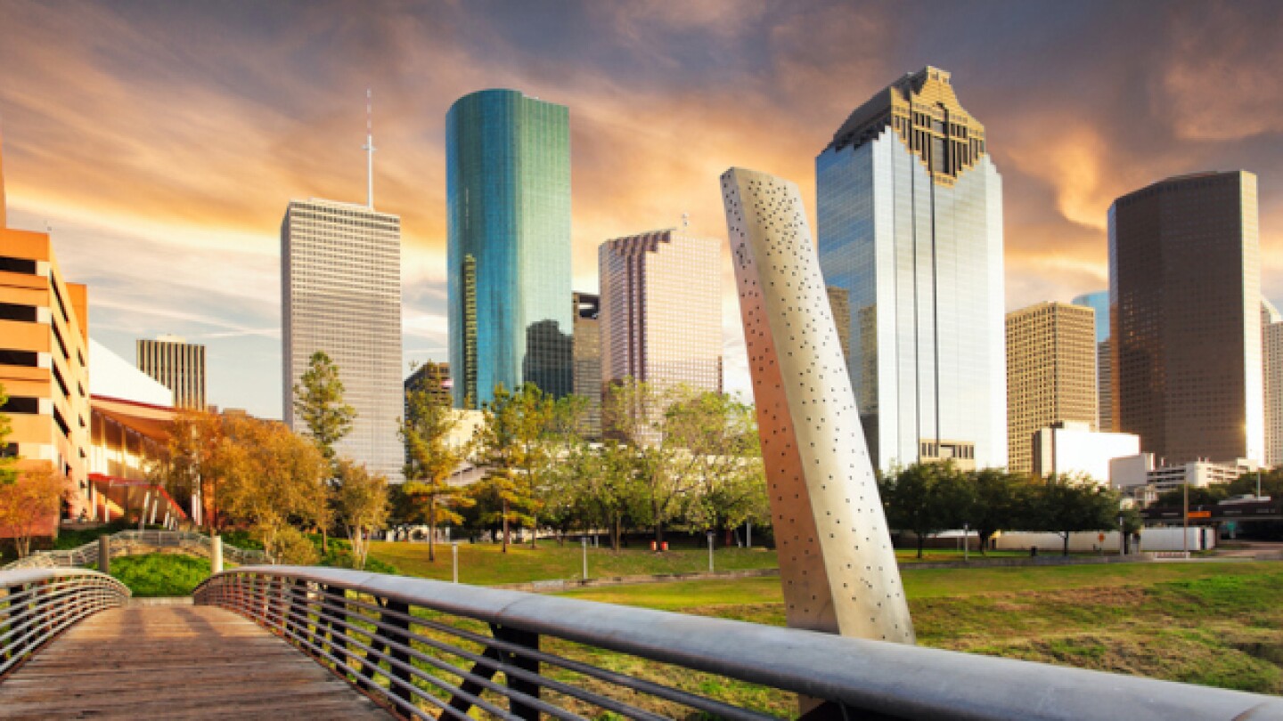 A park in Houston with skyscrapers in the backgrou