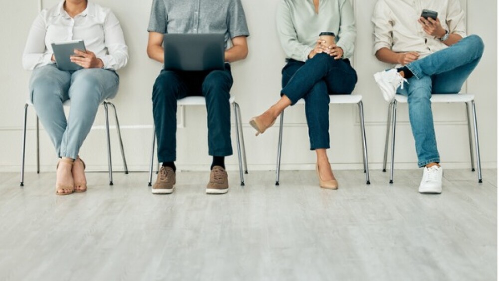 Pictured: Candidates wait for a job interview/iSto