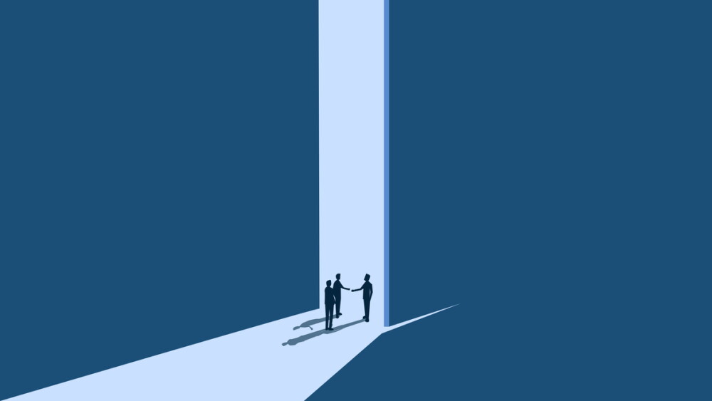 Orientation, Businessman opens the door to welcome new employees