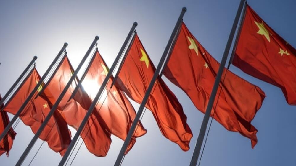 Pictured: Chinese flags in a row/iStock