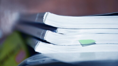 A stack of scientific journals/iStock, Olga Kadygr
