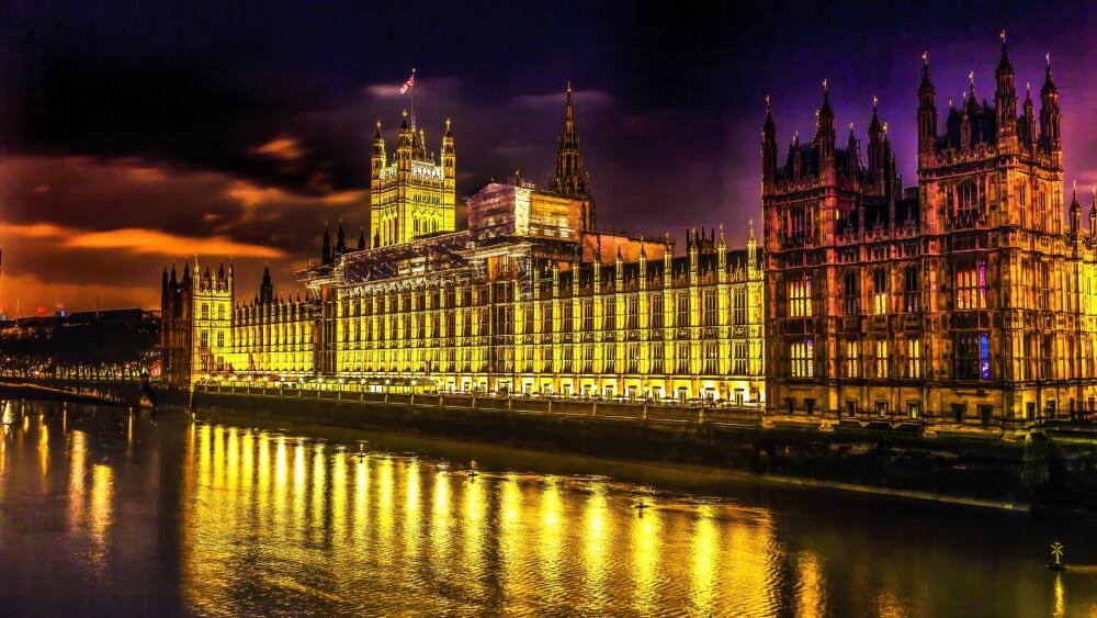 Victoria Tower Houses of Parliament Westminster Bridge Night Stars London England. Built in the 1800s, House of Commons and House of Lords.