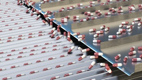 pharmacy medicine capsule pill in production line at medical factory