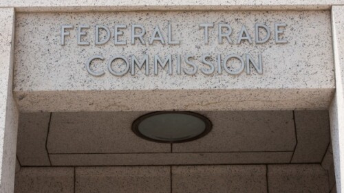 Pictured: FTC sign above a doorway/iStock, Gromit7