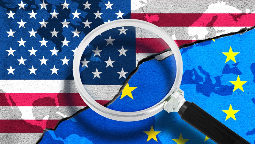 US (UNITED STATES) VS EU (EUROPEAN UNION) - Trade war and politics conflicts concept - Concept with flags painted on cracked wall