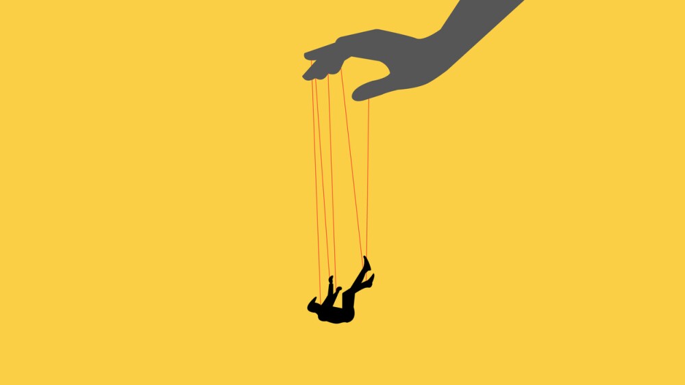 Illustration showing hand/puppeteer controlling falling businessman