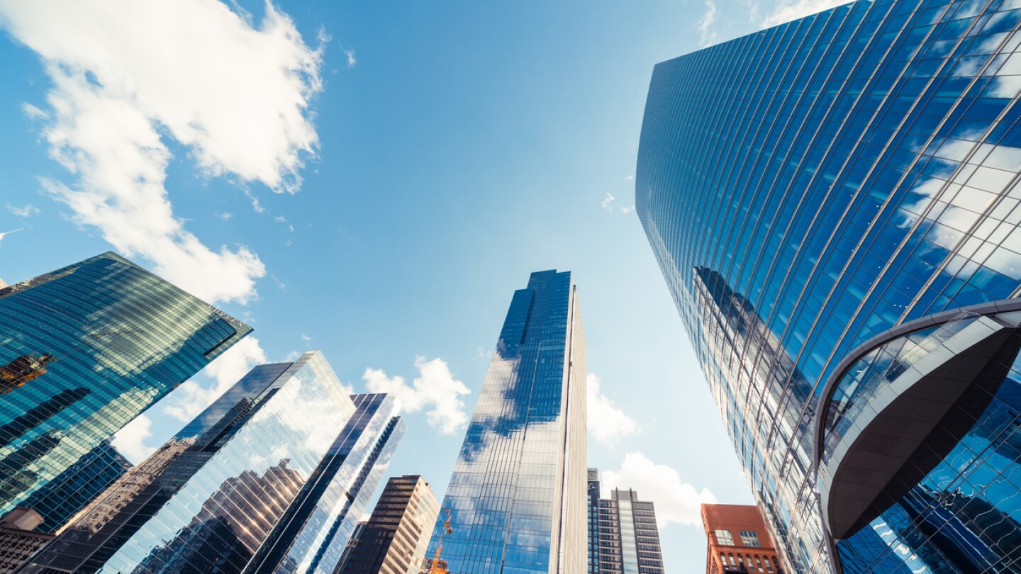 Modern tower buildings in financial district on sunny day in Chicago