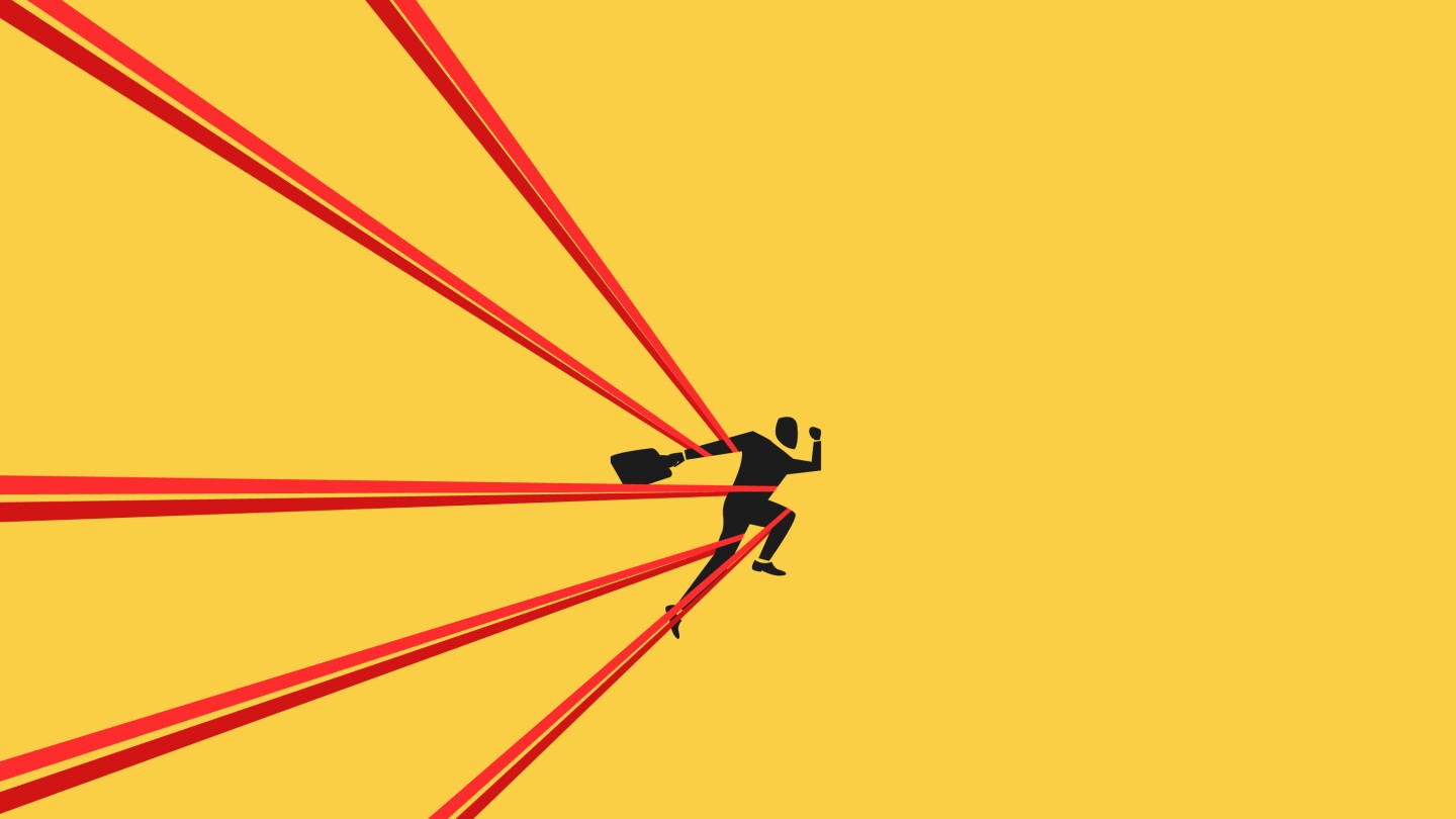 Businessman tied up with red tape. concept of struggle, limitation and trap or challenge