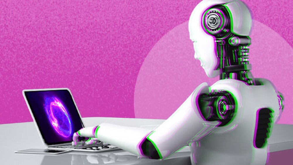 Pictured: AI robot working on a laptop
