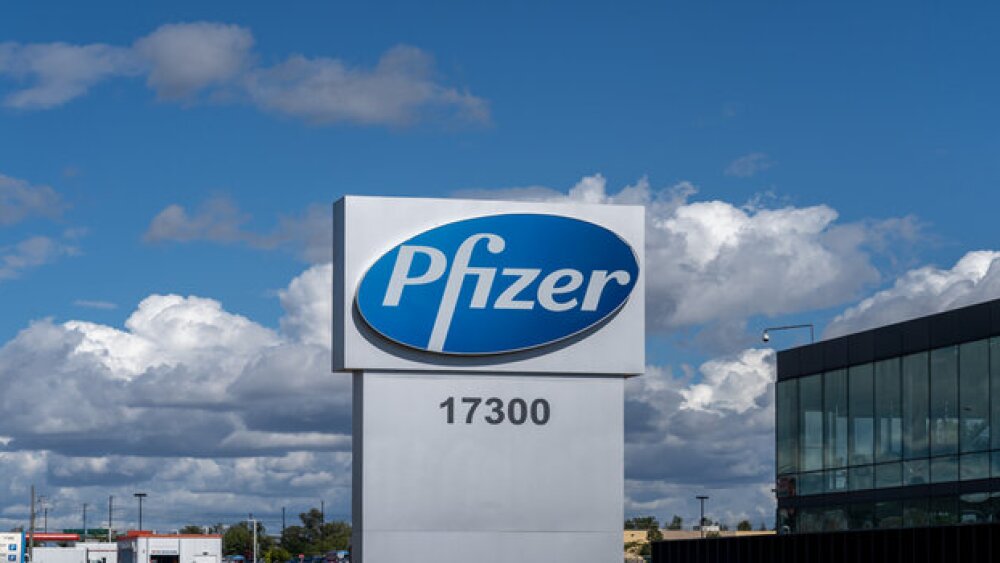 Pictured: Pfizer's signage outside its office in Canada/iStock, JHVEPhoto