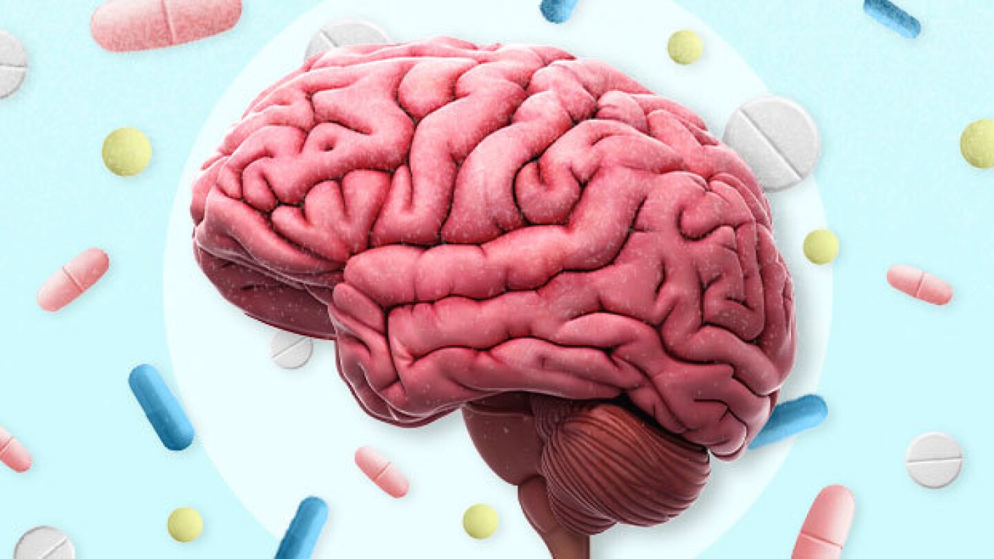 Pictured: A brain surrounded by falling pills
