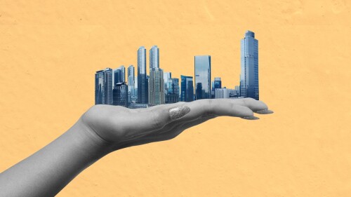 Human hand showing modern buildings and skyscrapers with a colored background. Collage art