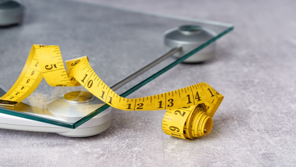 Pictured: a scale and tape measure_iStock, Tatiana