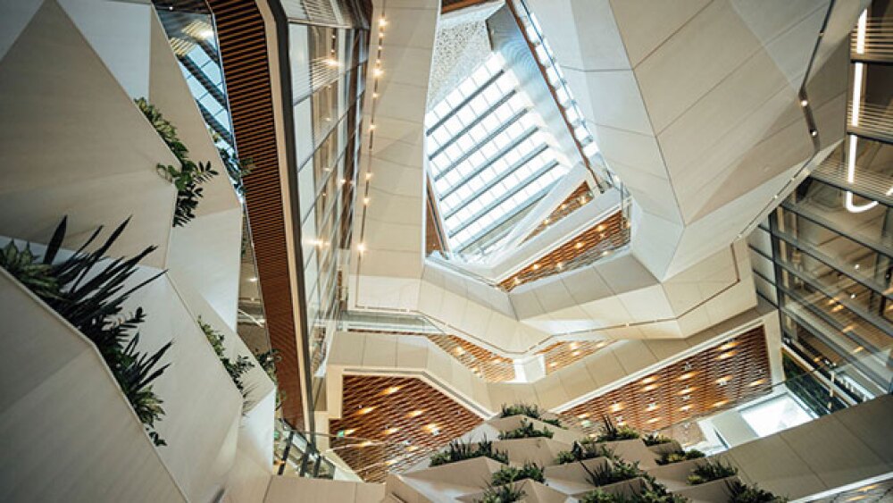 Pictured: The new Moderna headquarters features an atrium that reaches the full height of the six-floor building
