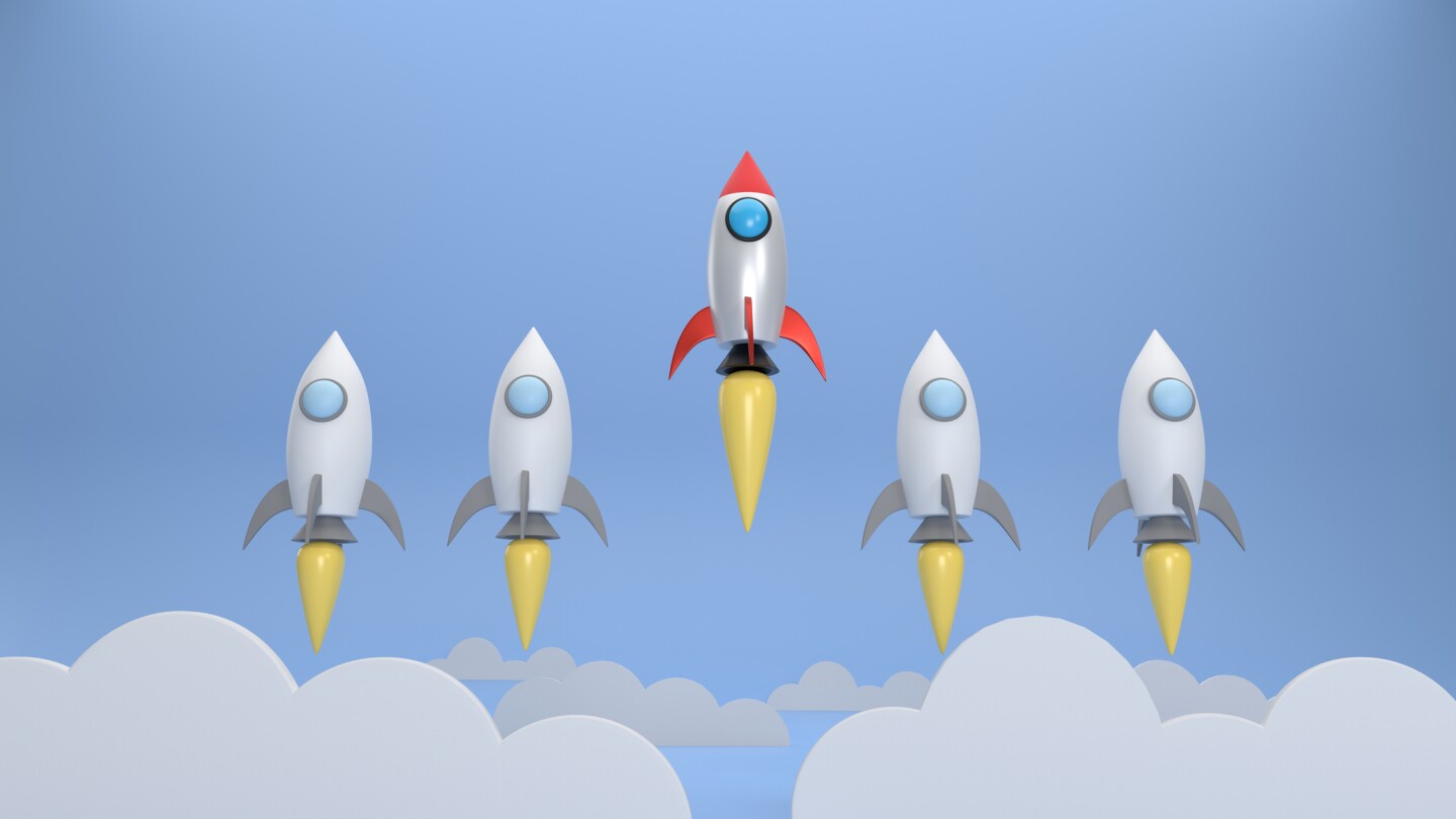 3D. The Red rocket that soars high and different than other rockets. Startup business successful concept.