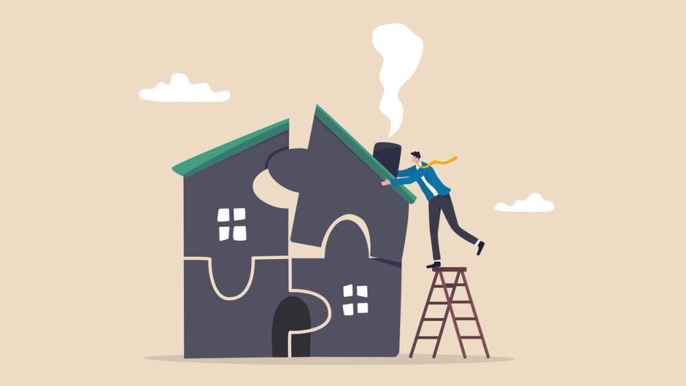 Plan to buying new house or renovation, mortgage loan or housing expense, property maintenance or real estate insurance concept, smart businessman put jigsaw to complete or finishing house puzzle.