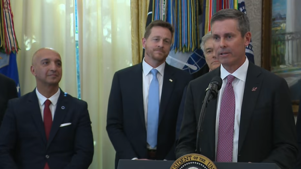 Eli Lilly CEO David Ricks speaks at the White House on Thursday, November 6. Novo Nordisk CEO Maziar Mark Doustdar is seen far left.
