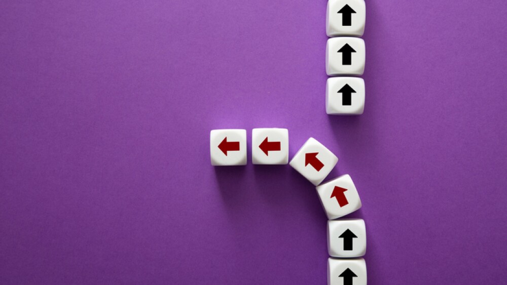 White cubes forming a path, red arrows indicating a divergent choice or new direction