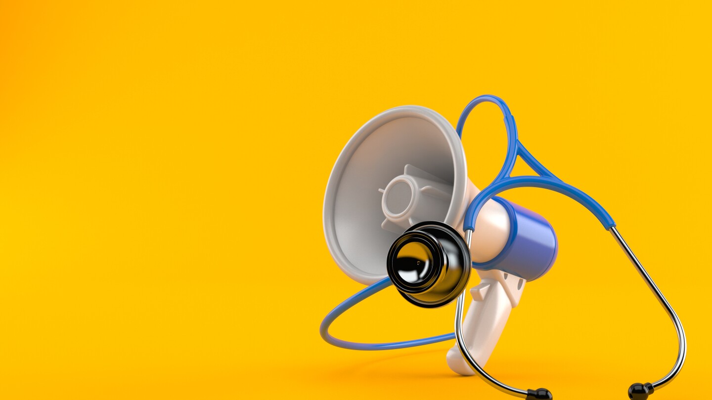 Megaphone with stethoscope isolated on orange background. 3d illustration