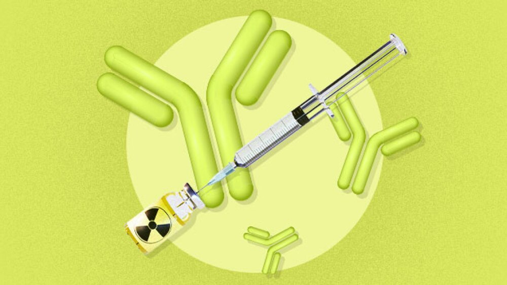 syringe in a vial with a radioactive symbol against a background of antibodies