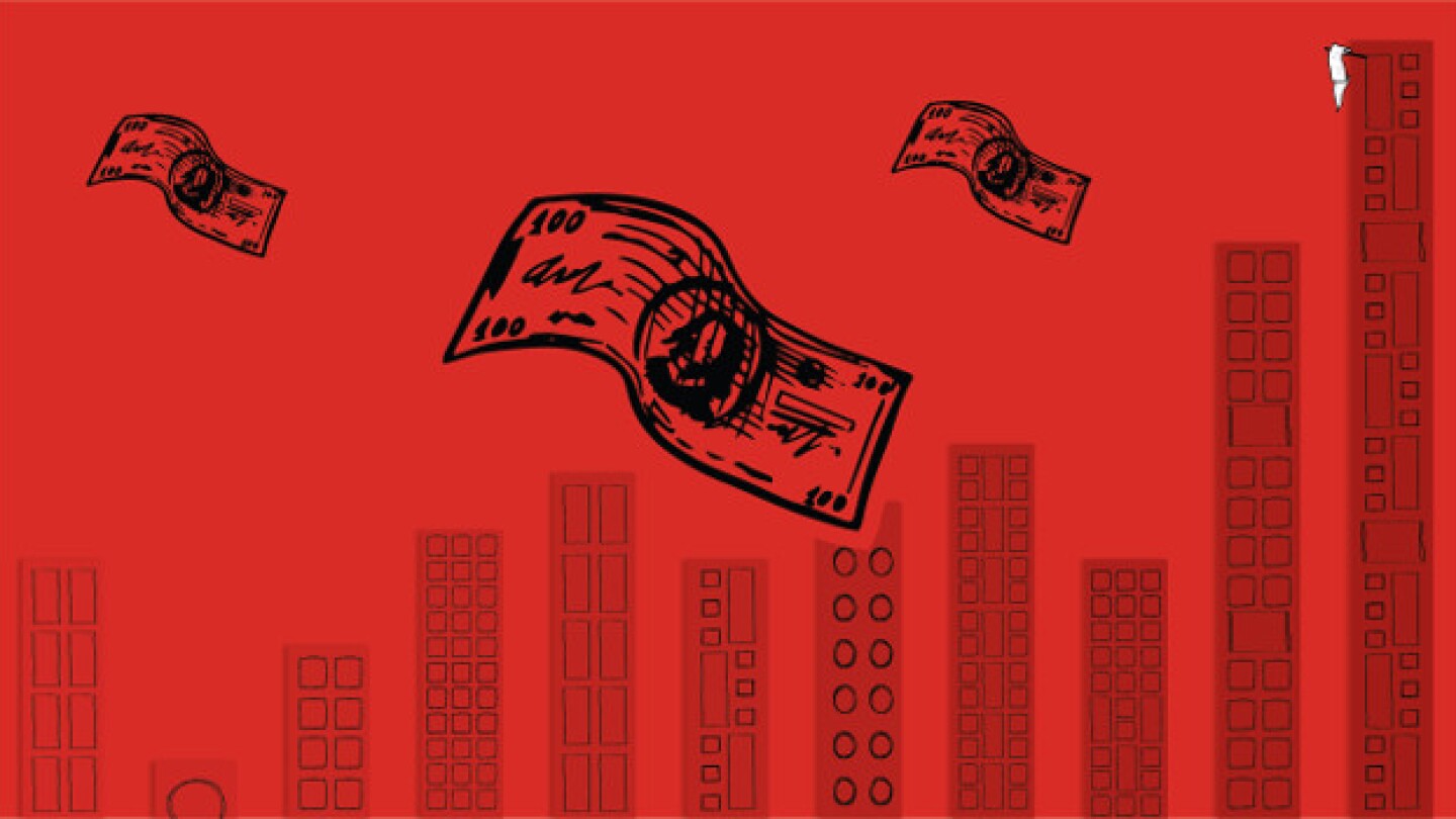 Money floats by skyscrapers, including one from wh