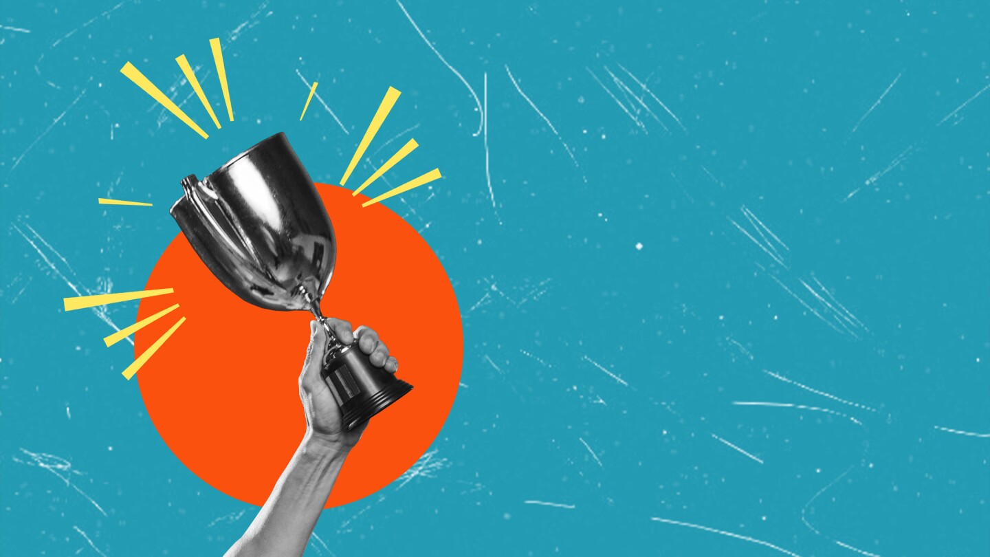 A contemporary artistic collage featuring a hand holding a trophy. The concept of victory and achievement.