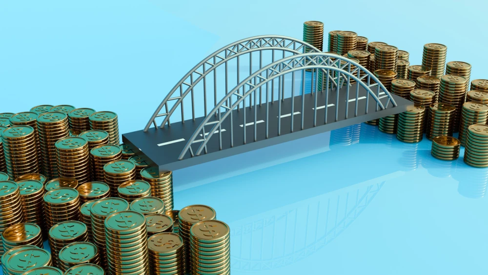 A 3D rendering of an old, simple arch bridge connecting two groups of stacked gold coins. It represents financial support, fund flow, investment, or bridging a monetary gap.
