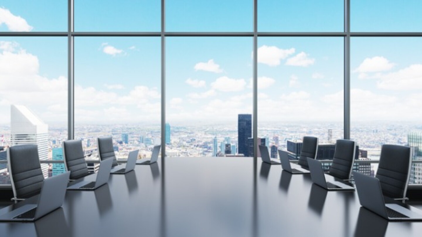 Pictured: Boardroom overlooking a city/iStock, ism