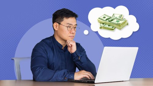 Pictured: Man looking at his computer thinking about asking for a raise