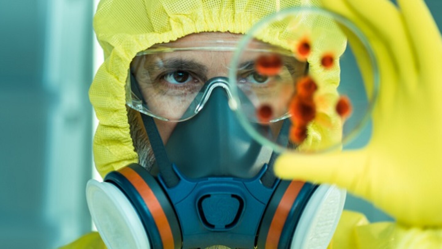 Man working with dangerous viruses in the laboratory