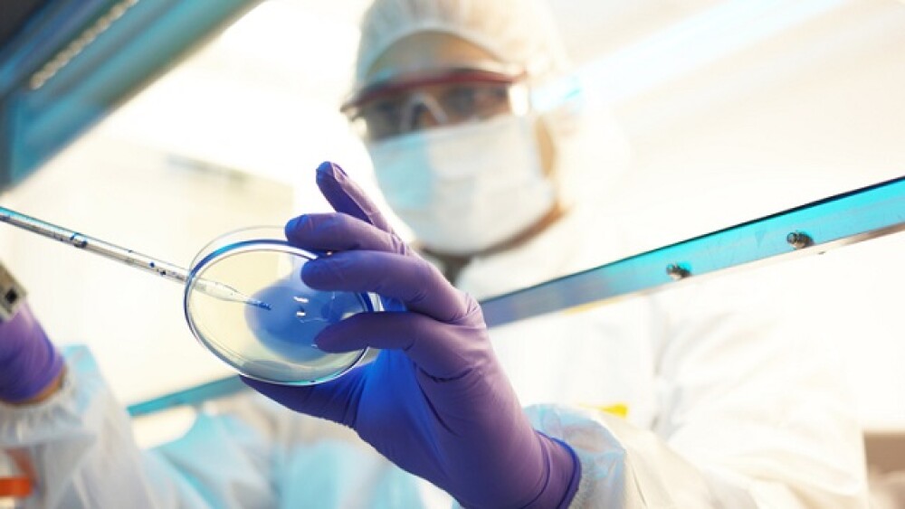 Pictured: Scientist in lab/Courtesy, Getty Images