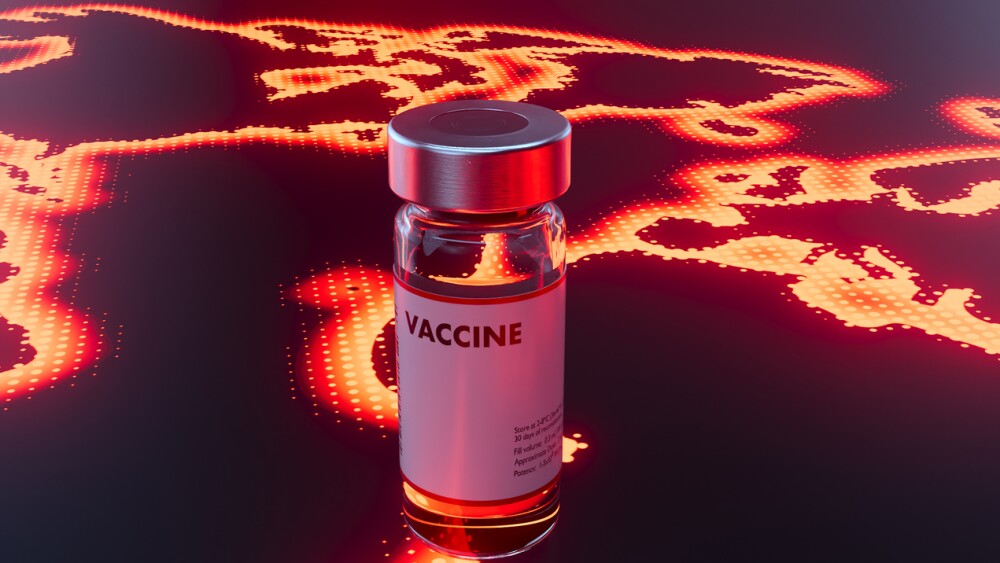 A bottle of a vaccine on a reflective surface with the illuminated red outline of the world map in red - 3D render