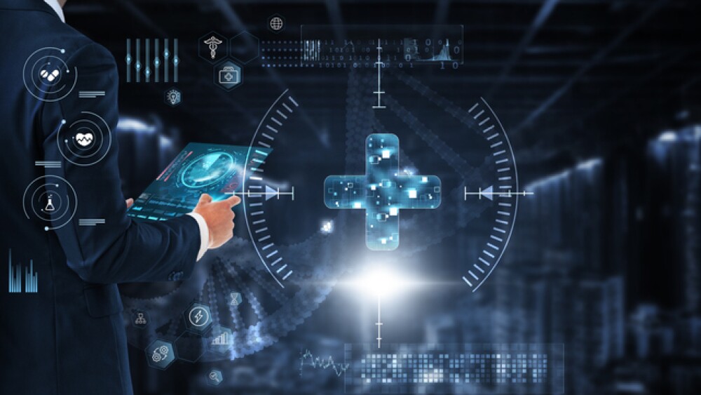 Businessman controlling and monitoring health care system on a digital screen.