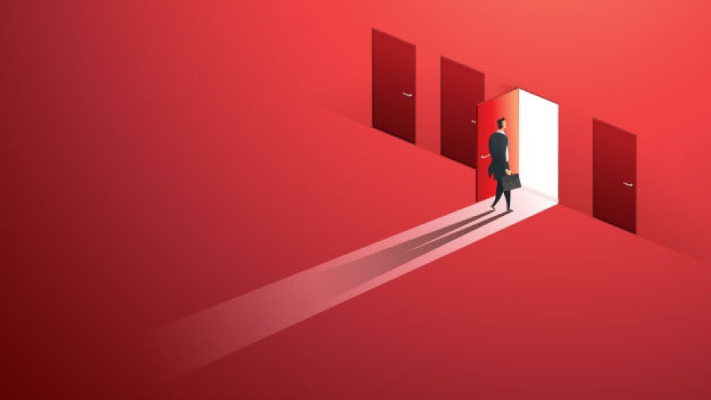 Pictured: A red illustration of a businessman walk
