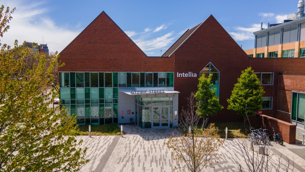 The headquarters of Intellia Therapeutics, a brick building with two triangular shapes in its roof