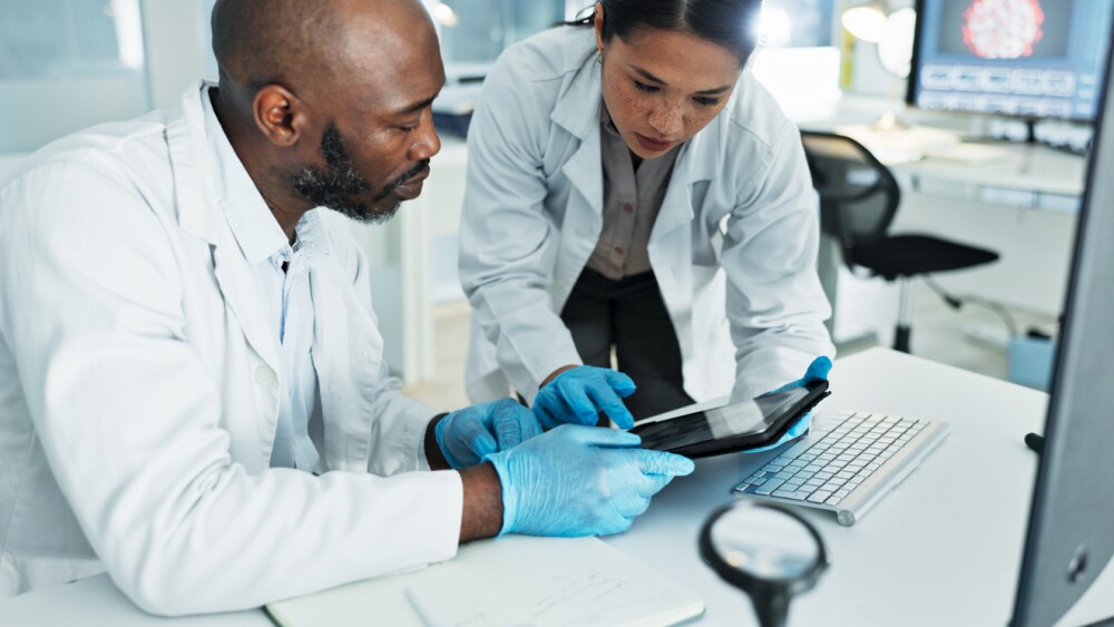 Photo of scientists working in lab