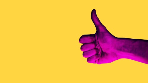 Isolated hand photo on yellow background. Pink hand collage style. Bright pop art template with space for text. Creative minimalistic backdrop.