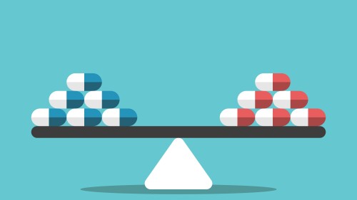Different pills on seesaw weight scale. Comparison, choice, healthcare and medicine concept. Flat design. EPS 8 vector illustration, no transparency, no gradients