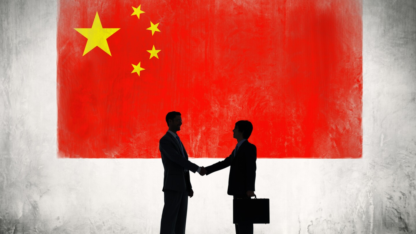 Business people shaking hand in China.