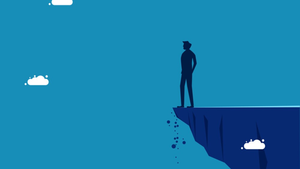 Business vision and opportunity and determination. Businessman standing on cliff edge looking ahead. vector
