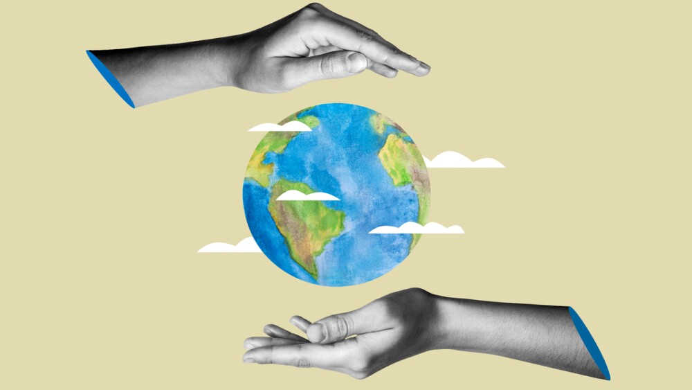 The concept of environmental protection. Earth in hands on a beige background. Earth Day. Collage