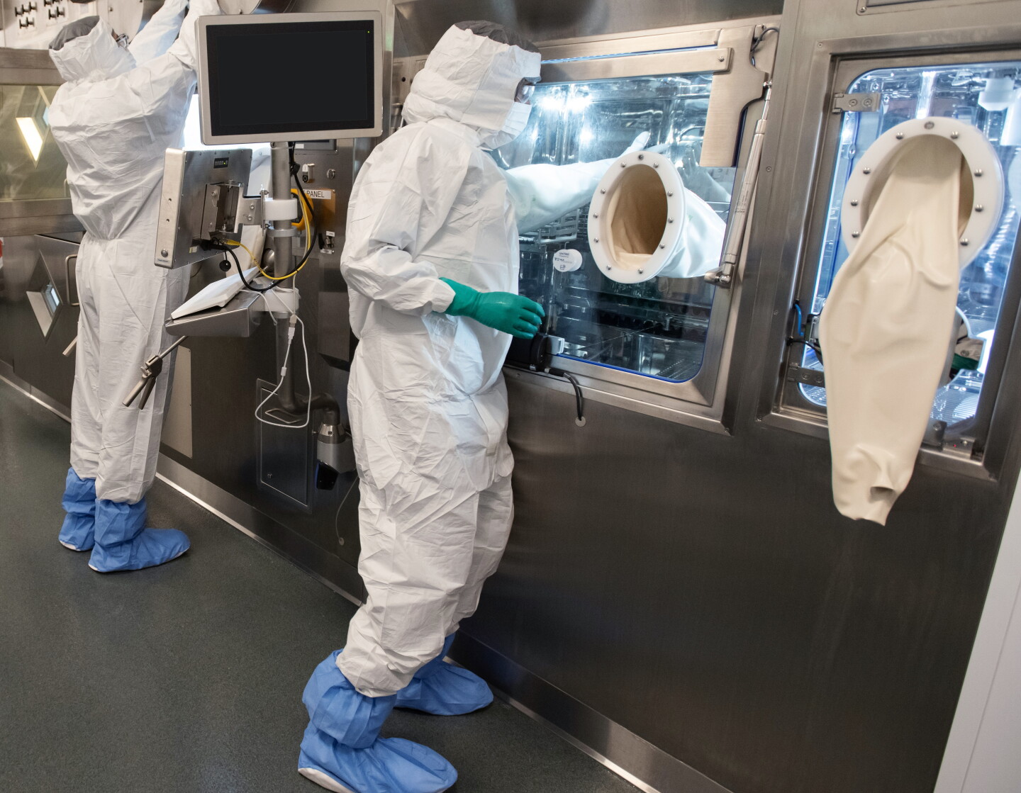 Specialists on the production line at Novartis' radioligand therapy manufacturing facility in Indianapolis, Indiana.