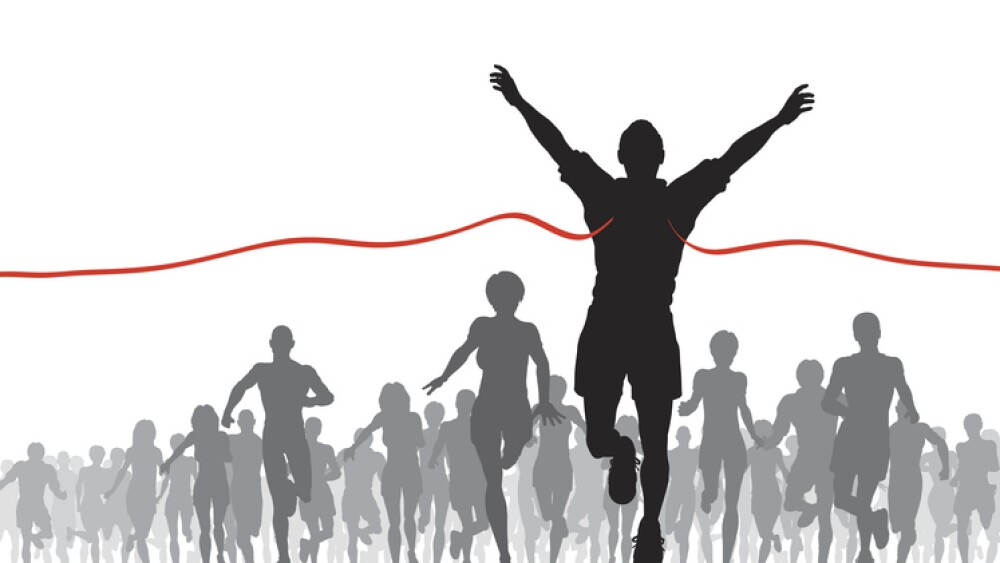 Editable vector illustration of a man winning a race. Hi-res jpeg file included.