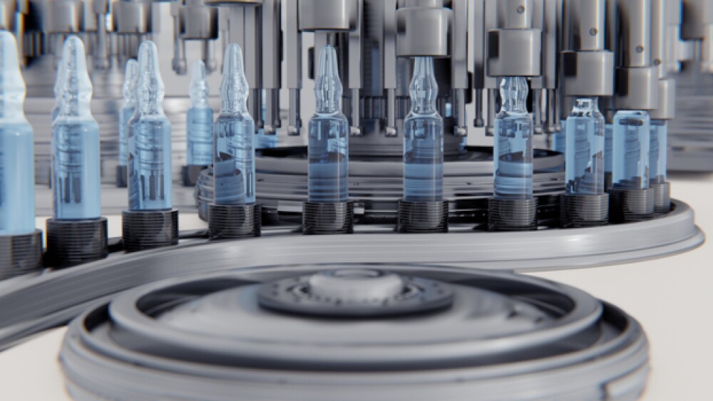 Close-up of medical ampoule production line