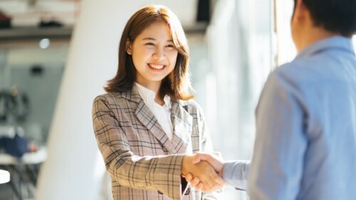 success business people shake hands.
